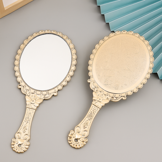Feminine rose gold retro handheld mirror with ergonomic handle, perfect for travel