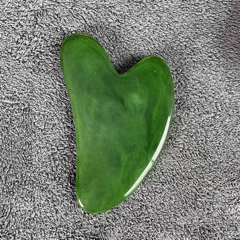 Natural gua sha skincare tool for stress relief, sculpting jawline and mindful self-care