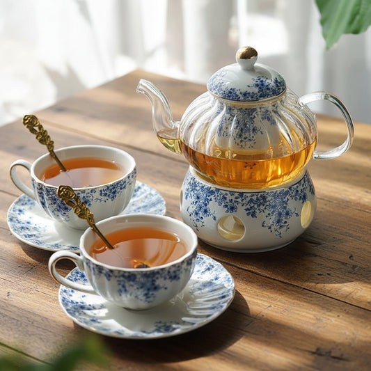 Blue and white porcelain tea set with English-style teapot, cups and saucers