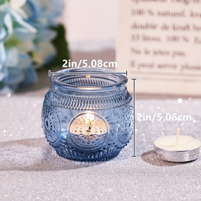 Blue glass votive candle holder for tea lights with a smooth translucent finish