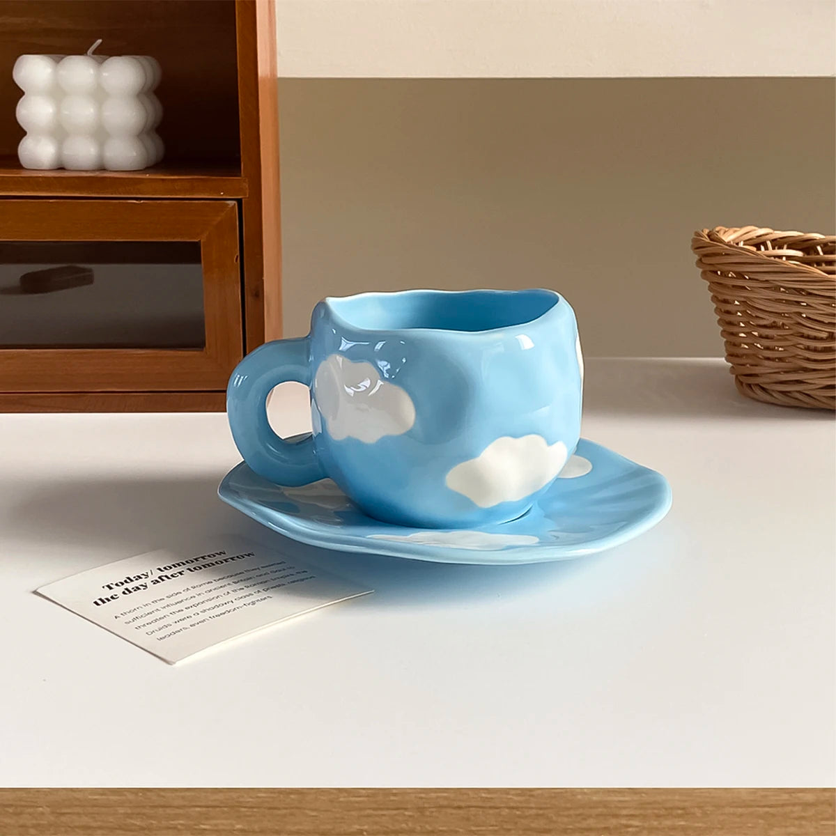 Cool blue cloud mug and saucer set with soft blue finish and white cloud design, 280ml ceramic cup