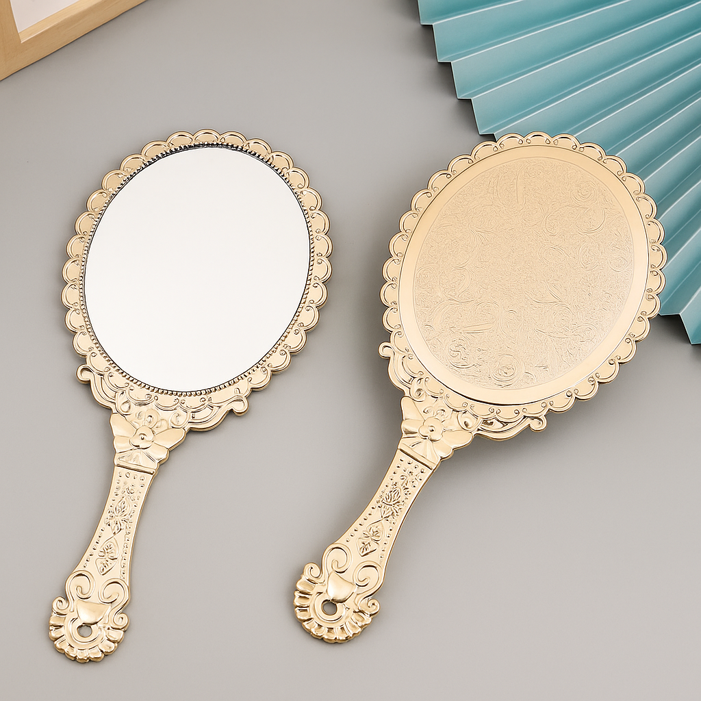 Feminine rose gold retro handheld mirror with ergonomic handle, perfect for travel