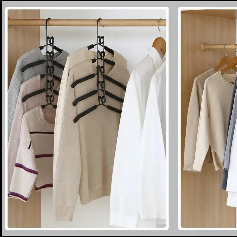 Multi-layered hanger with clothes on a wooden rack, showing its versatility.